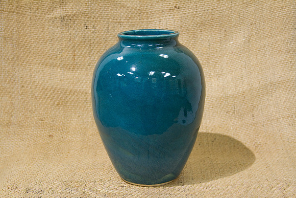 A Paul Laverty_Vase Green Color 10 x 7, $125